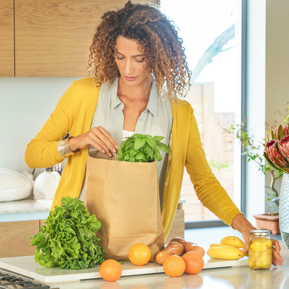 woman-unloading-grocery-bag-0319