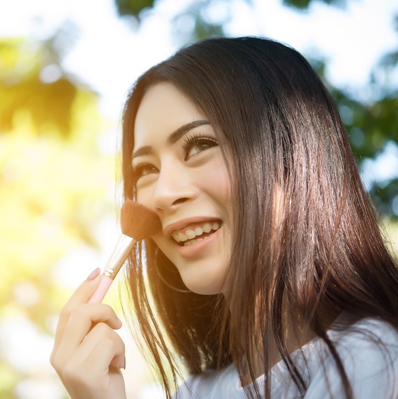 skincare-spf-woman-applying-makeup-0719