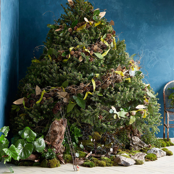 large christmas tree adorned with pine cones and moss large christmas tree adorned with pine cones and moss