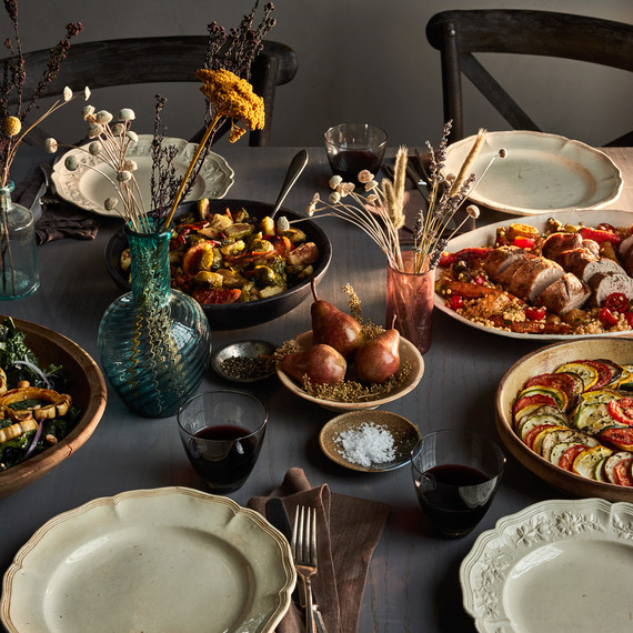 fall potluck table setting with food ready for serving fall potluck table setting with food ready for serving