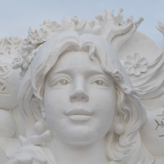 Girl and snowflake snow ice sculpture Girl and snowflake snow ice sculpture