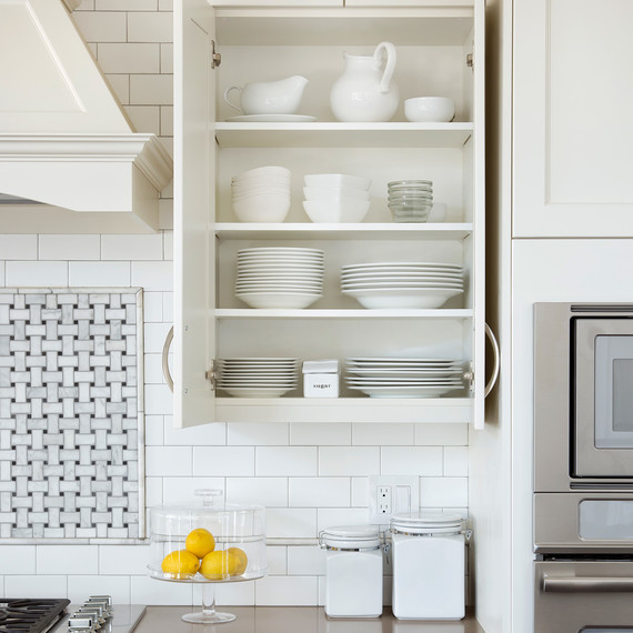 organized white dishes cabinet in kitchen organized white dishes cabinet in kitchen