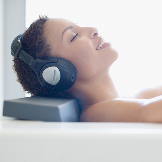 woman headphones self care bath woman headphones self care bath