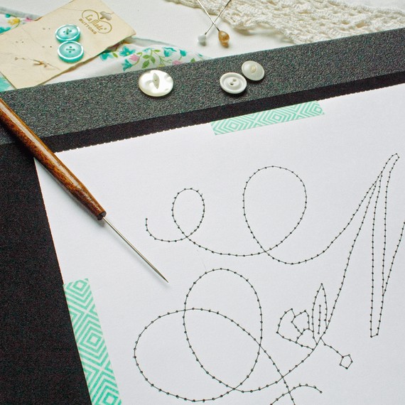 emboidered monogram pattern on carbon paper emboidered monogram pattern on carbon paper