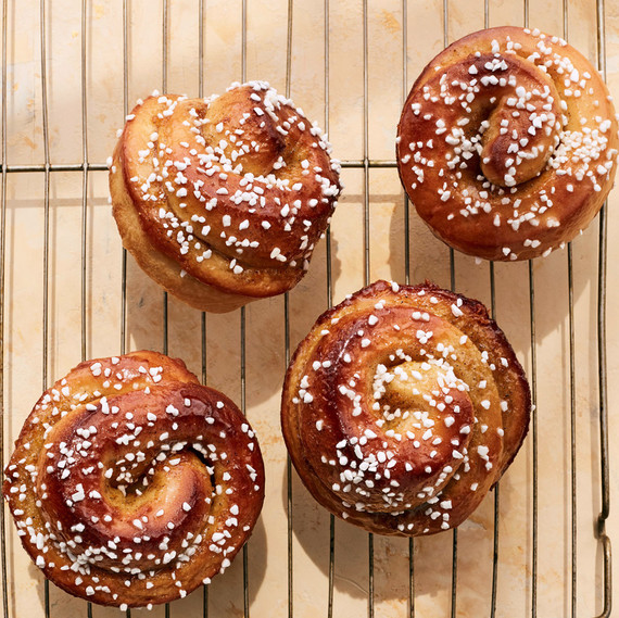 orange cardamom morning buns on cooling rack topped with sanding sugar orange cardamom morning buns on cooling rack topped with sanding sugar