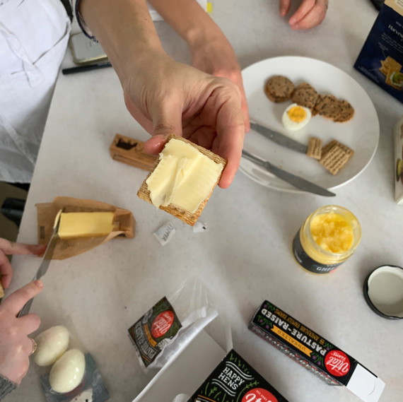 spreading butter on crackers spreading butter on crackers