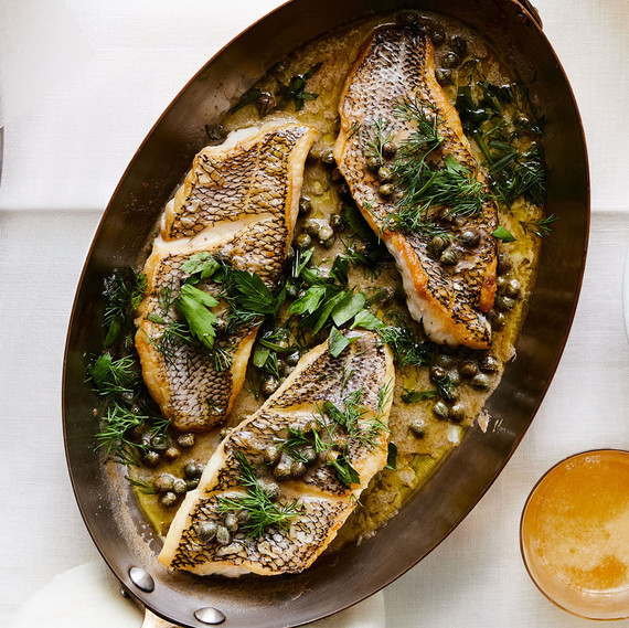 Black Sea Bass with Capers and Herb-Butter Sauce in large pan Black Sea Bass with Capers and Herb-Butter Sauce in large pan