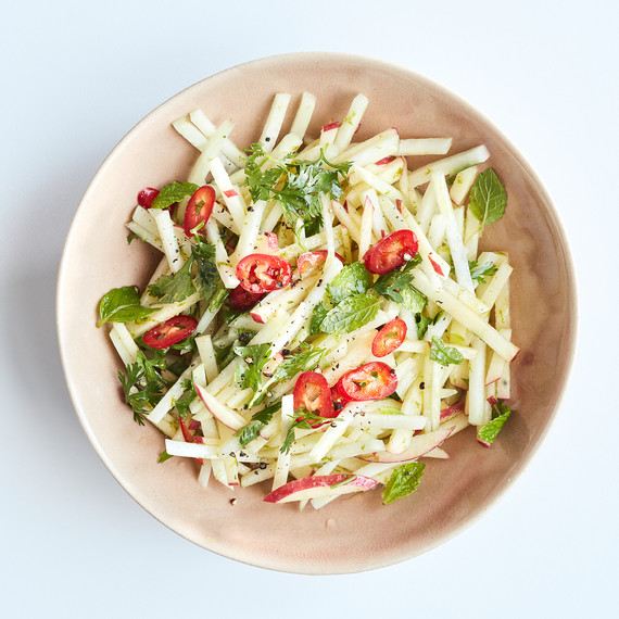 kohlrabi apple and mint slaw in white bowl kohlrabi apple and mint slaw in white bowl