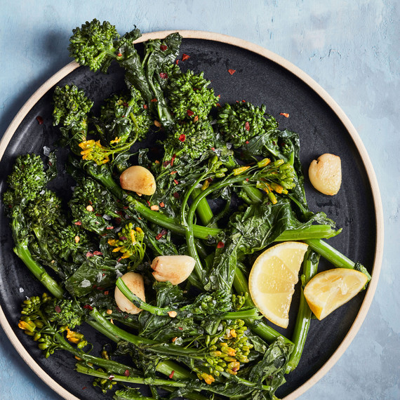 simply sauteed broccoli rabe healthy sidedish on blue table simply sauteed broccoli rabe healthy sidedish on blue table