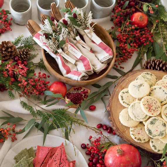 red and green winter holiday table details red and green winter holiday table details