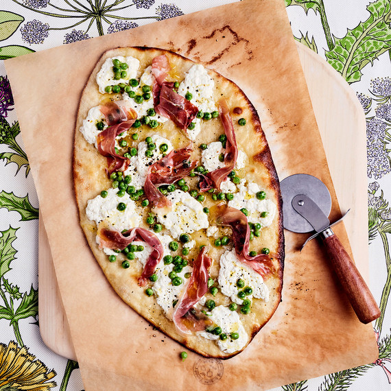 roman thin-crust pizza with prosciutto, ricotta, and peas roman thin-crust pizza with prosciutto, ricotta, and peas