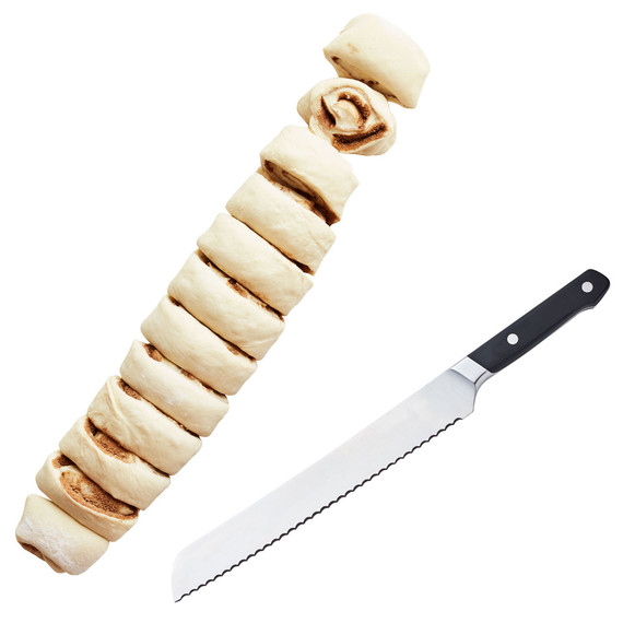 knife and cinnamon rolls log dough knife and cinnamon rolls log dough