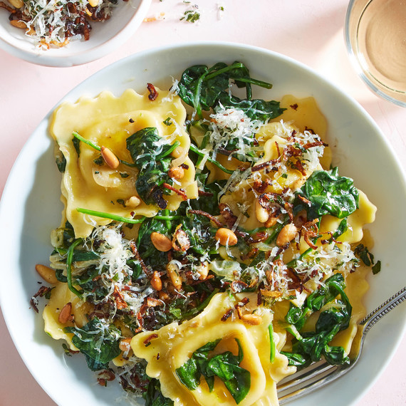 brown butter ravioli in white bowls brown butter ravioli in white bowls