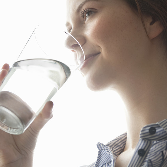woman drinking glass of water woman drinking glass of water