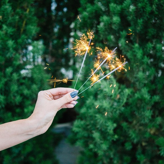 sparklers in hand sparklers in hand