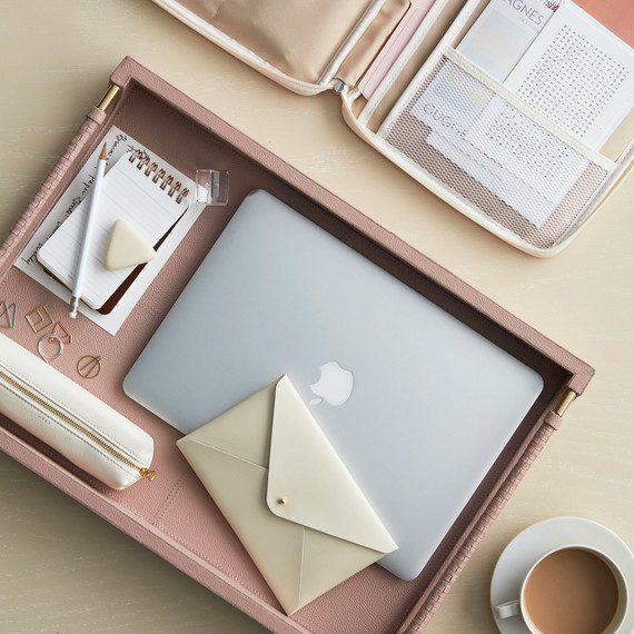 pink tray with office equipment and supplies pink tray with office equipment and supplies