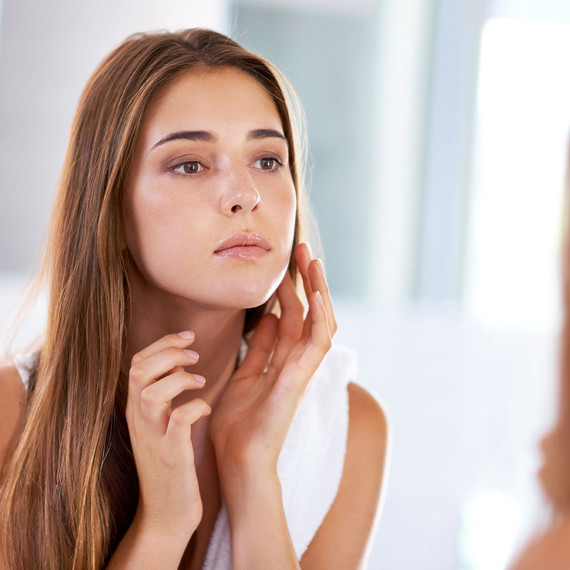 woman looking in mirror woman looking in mirror