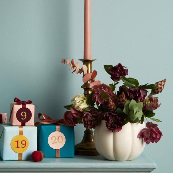 mantle blue wall flowers presents and candle details