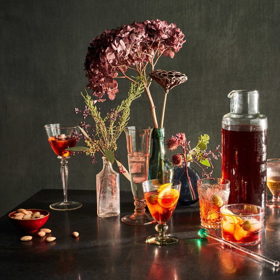 sherry and negroni cocktails and bowl of almonds sherry and negroni cocktails and bowl of almonds