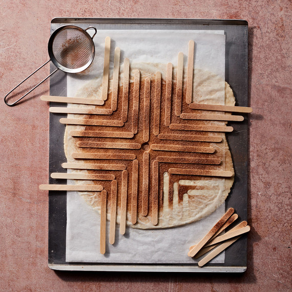 popsicle stick stencil art with sprinkled cinnamon sugar on pie crust popsicle stick stencil art with sprinkled cinnamon sugar on pie crust