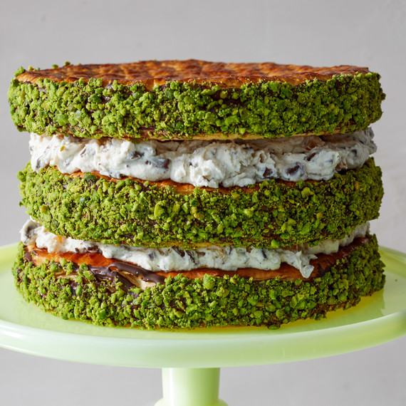 layered cannoli cake on green stand layered cannoli cake on green stand