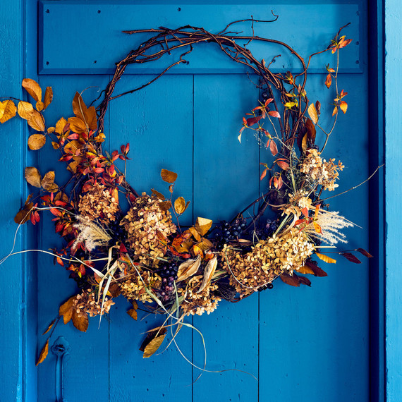 wreath hanging on blue door wreath hanging on blue door