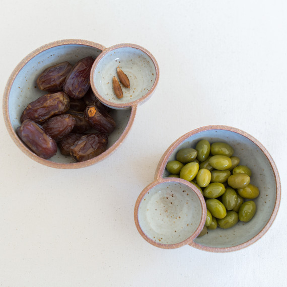 ceramic food bowls with olives and dates ceramic food bowls with olives and dates