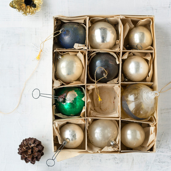 box of old glass christmas baubles gold green and gray box of old glass christmas baubles gold green and gray