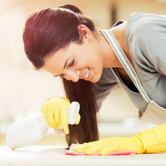 woman cleaning bleach woman cleaning bleach