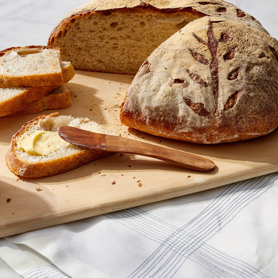 artisan boule bread martha bakes cutting board slice butter artisan boule bread martha bakes cutting board slice butter
