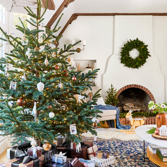living room with christmas tree and presents emily henderson living room with christmas tree and presents emily henderson