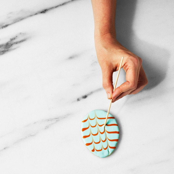 martha using toothpick to draw chevron pattern on cookies martha using toothpick to draw chevron pattern on cookies