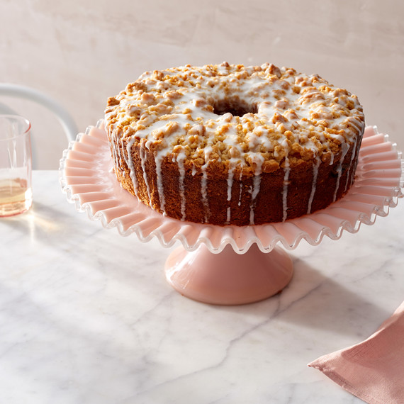 meyer lemon coffee cake on pink stand meyer lemon coffee cake on pink stand