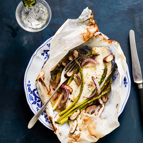 Flounder en Papillote with Asparagus and Shiitake Mushrooms on decorative plate Flounder en Papillote with Asparagus and Shiitake Mushrooms on decorative plate