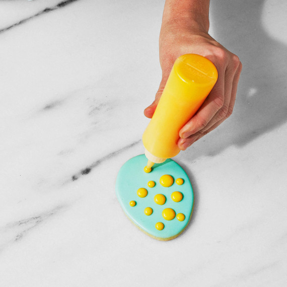 martha putting polka dots on cookies martha putting polka dots on cookies