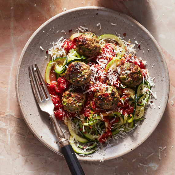 beef-zucchini meatballs with sauteed zucchini spirals topped with parmesan cheese beef-zucchini meatballs with sauteed zucchini spirals topped with parmesan cheese